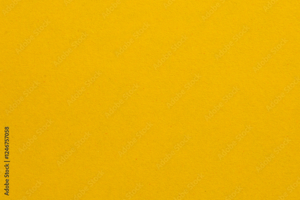 A yellow background with a white object in the middle, textured origami paper backdrop A yellow background with a white object in the middle, textured origami paper backdrop