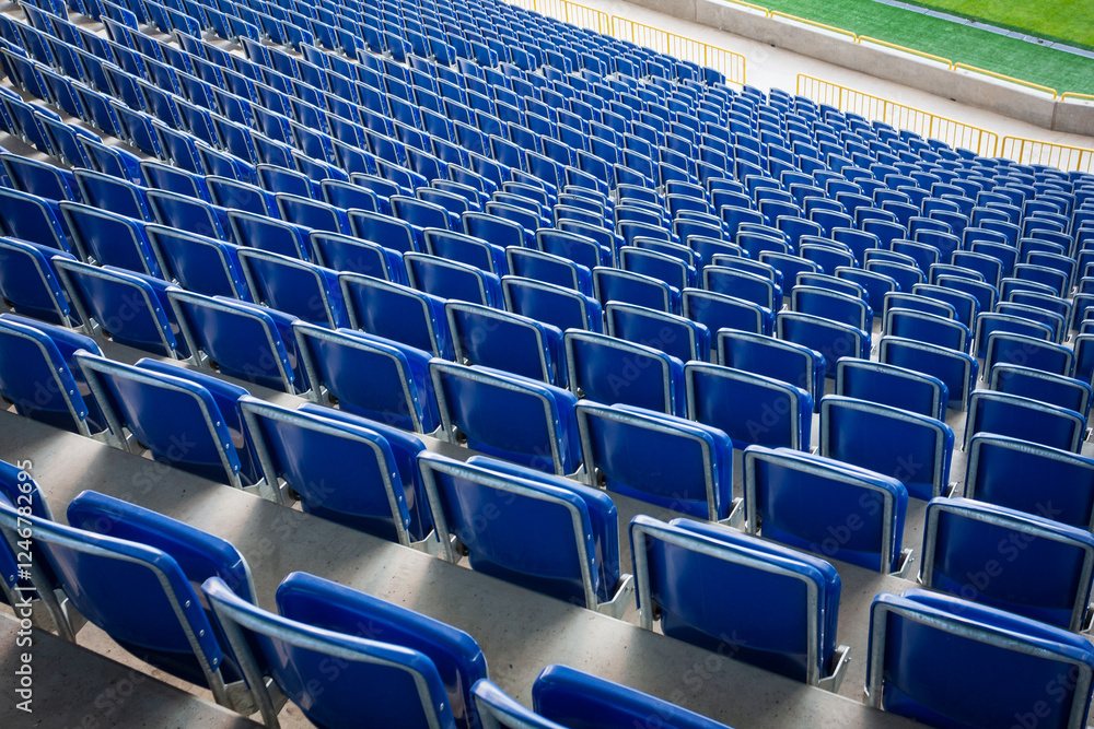 Naklejka premium blue seats on city stadium