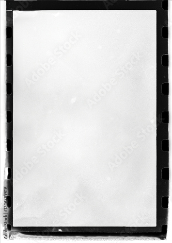 Wallpaper Mural A blank vintage film negative frame with perforations on the sides, featuring a sepia-toned texture and slight scratches, resembling old analog photography materials. Torontodigital.ca