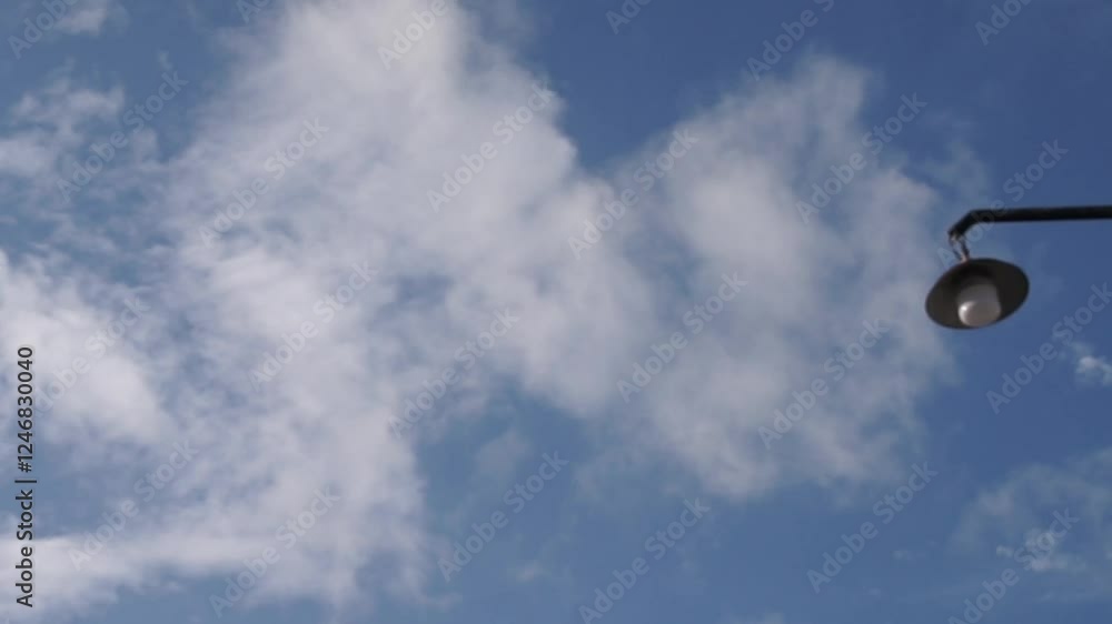 beautiful white clouds in the clear sky and the wind blowing beautiful white clouds in the clear sky and the wind blowing