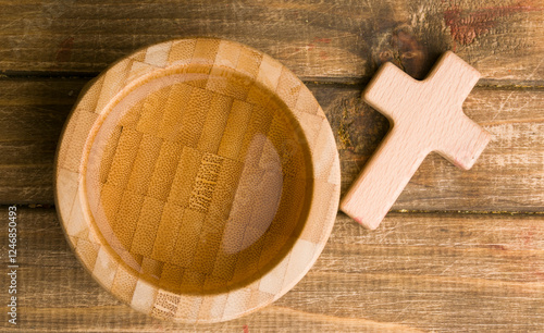 Holy food and cross on a wooden background. Concealment of the Holy Food of Jesus Christ photo