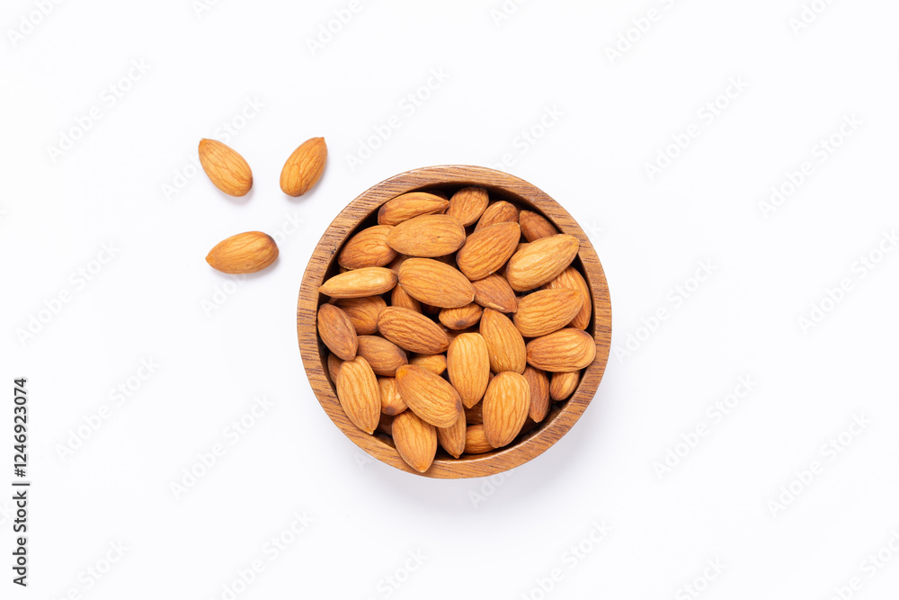 Almond nuts in Wooden bowl isolated on white background top view Almond nuts in Wooden bowl isolated on white background top view