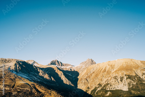 Majestic mountains of Livigno, Italy under clear skies