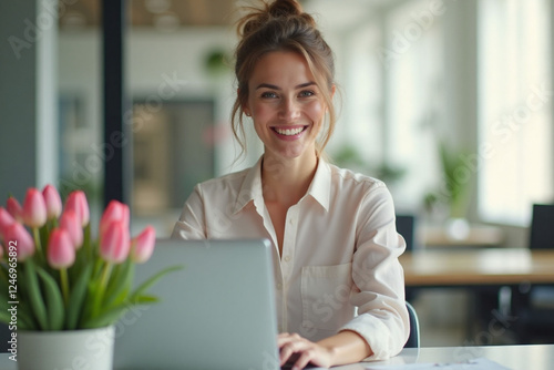 businesswoman working on laptop tulips