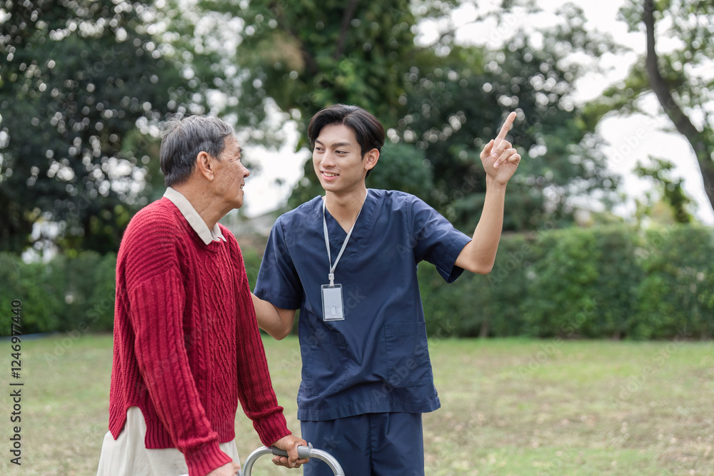 Naklejka premium Nurse joyfully explaining something to elderly man with walker in a vibrant garden setting