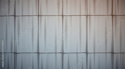 Wallpaper Mural A textured tile wall creates a geometric background with a modern, slightly weathered aesthetic. Torontodigital.ca