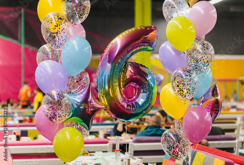 Photography Photo of number 6 made from foil balloon indoors at birthday party