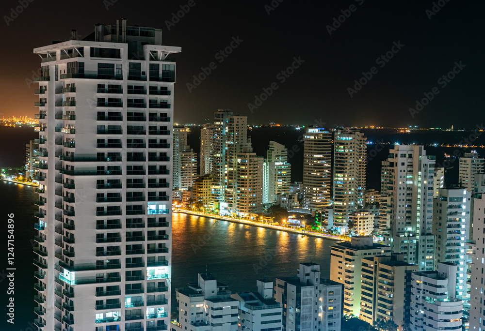 Illuminated cityscape of modern high rise buildings at night