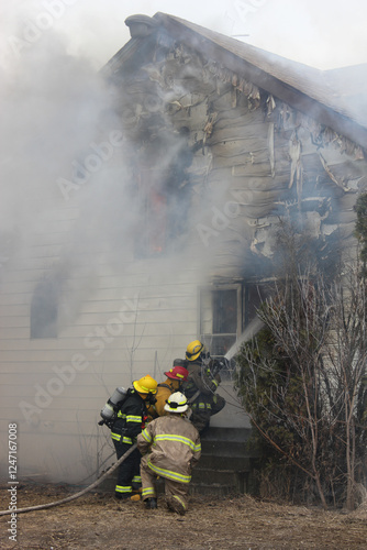 Volunteer Firefighters Training On Live Structure Fire in Saskatchewan