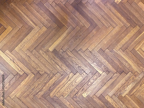 Elegant Dark Wood Herringbone Parquet Flooring with Rich Texture and Warm Natural Tones for Interior Design Background
