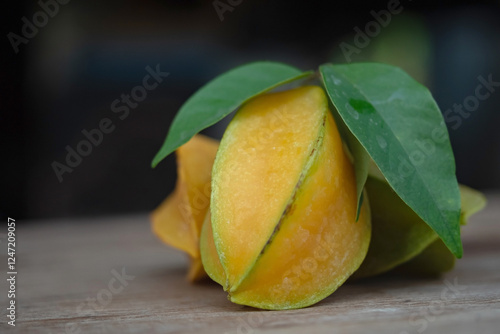 Close up of Carambola fruit on wood table,selective focus photo