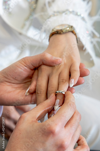 bride and groom holding hands