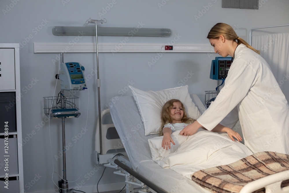 Obraz premium A compassionate nurse providing attentive care for a sick child in a hospital room setting