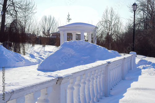 the fence of the observation deck and the gazebo in the noble estate