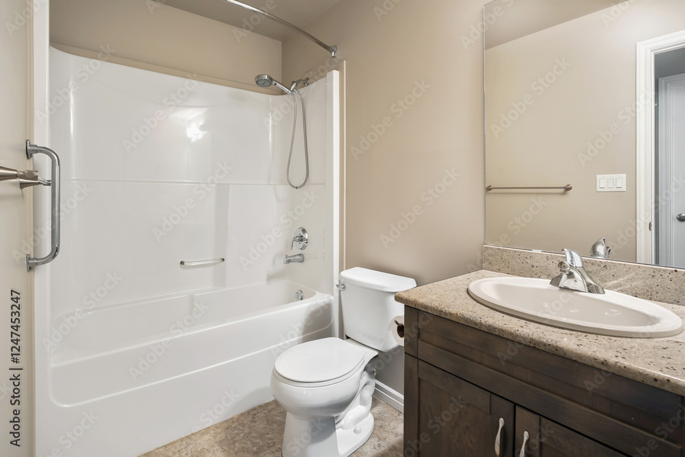 A bathroom with a white toilet and sink A bathroom with a white toilet and sink