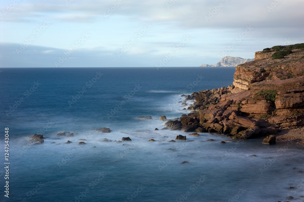 the Cala Viola gulf in the Porto Conte Regional Park, Alghero, Sassari, Sardinia, Italy. Long exposure and Motion blur on sea waves. the Cala Viola gulf in the Porto Conte Regional Park, Alghero, Sassari, Sardinia, Italy. Long exposure and Motion blur on sea waves.