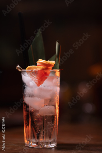 cocktail in a restaurant, professional shooting. a cocktail glass filled with a bright drink, decorated with additional decor. professional photography of a drink