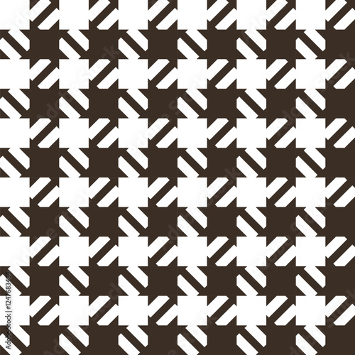 Seamless houndstooth pattern. Classic plaid design. It is characterized by a pattern of alternating squares resembling a scattered star in two colors.