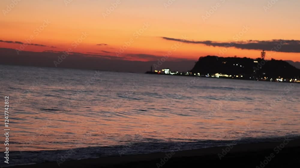 Breathtaking sunset over a serene beach, with stunning silhouettes and golden hour light. Breathtaking sunset over a serene beach, with stunning silhouettes and golden hour light.