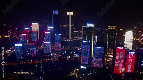 Chongqing Jiangbei Mouth CBD illuminated night light show with stunning aerial views highlighting urban vibrancy photo