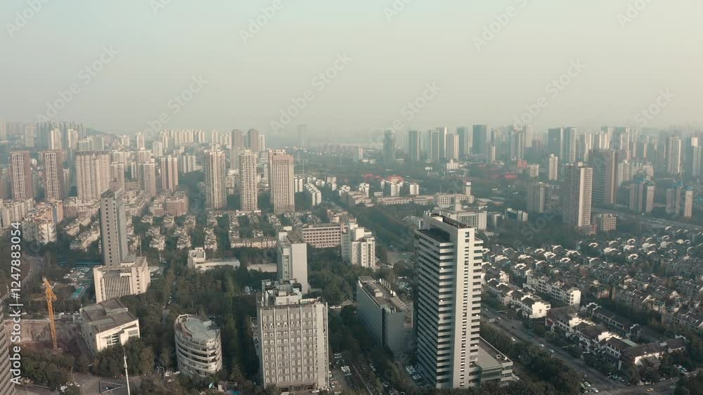 Captivating aerial view of a city beneath a hazy winter sky showcasing urban life and atmosphere Captivating aerial view of a city beneath a hazy winter sky showcasing urban life and atmosphere