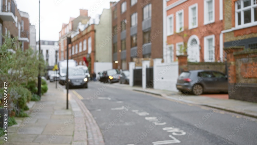 Blurred view of a london street in winter with bokeh effects showcasing urban architecture, defocused cars, and the characteristic charm of chelsea, united kingdom. Blurred view of a london street in winter with bokeh effects showcasing urban architecture, defocused cars, and the characteristic charm of chelsea, united kingdom.