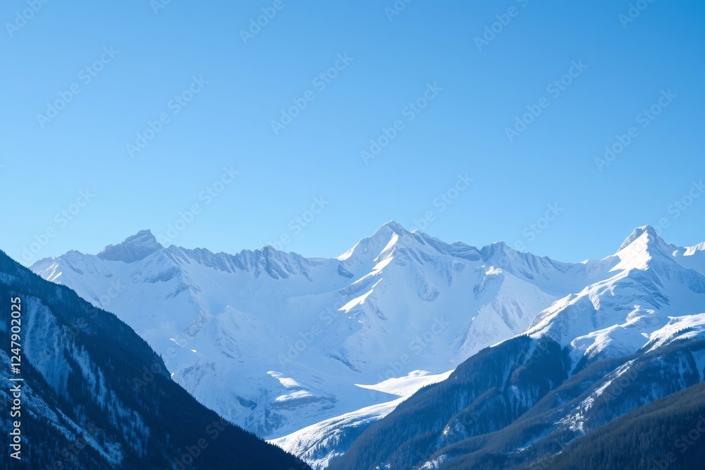 Scenic view of towering snow-covered mountains under a bright blue sky in winter, representing tranquility and the majesty of nature Scenic view of towering snow-covered mountains under a bright blue sky in winter, representing tranquility and the majesty of nature