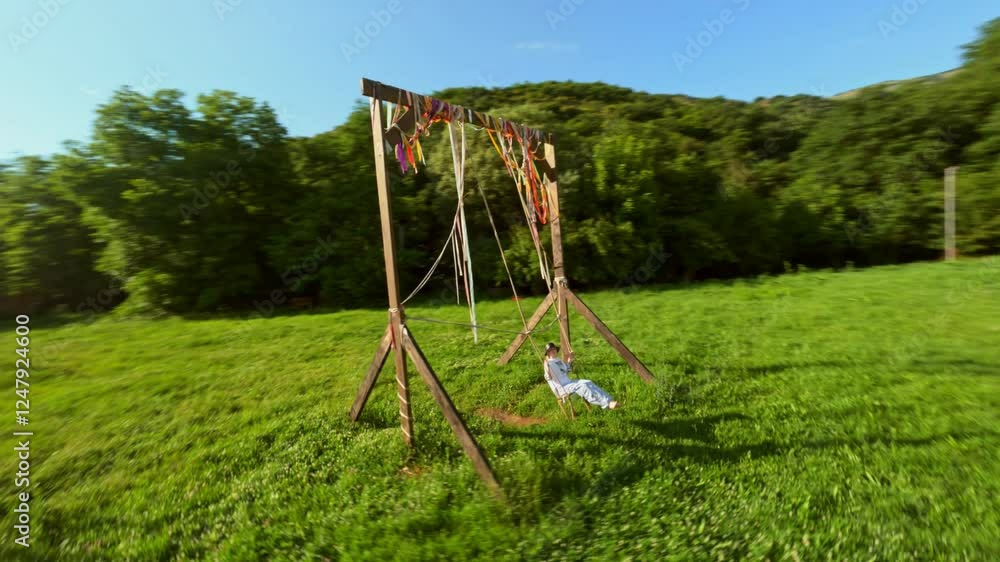 Swinging on a Swing in a Glamping Site Swinging on a Swing in a Glamping Site