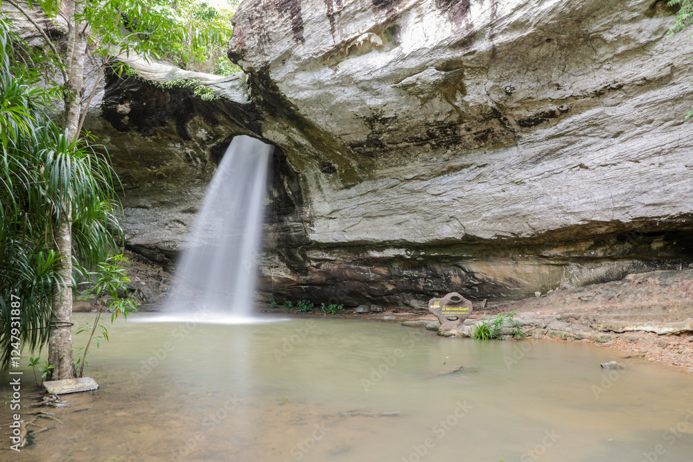 Naklejka premium Saeng Chan Waterfall (Long Ru Waterfall), Pha Taem National Park, “Unseen Thailand”, named after the waterfall that sprays mist through the rocks, giving it a soft white color similar to moonlight.