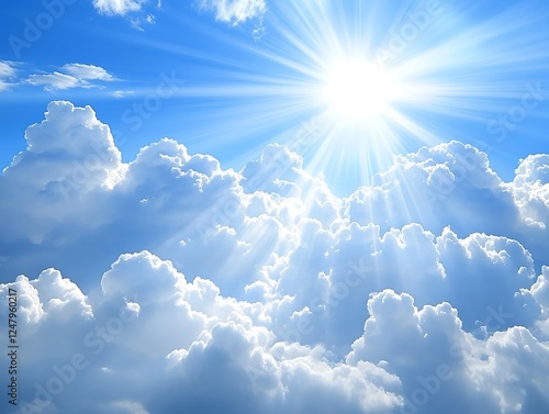 Fototapeta Naklejka Na Ścianę i Meble -  Radiant sun through fluffy clouds