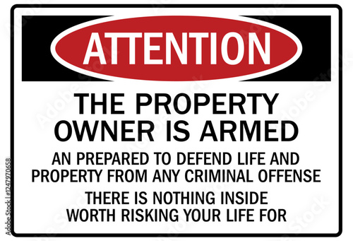 Gun owner safety sign the property owner is armed