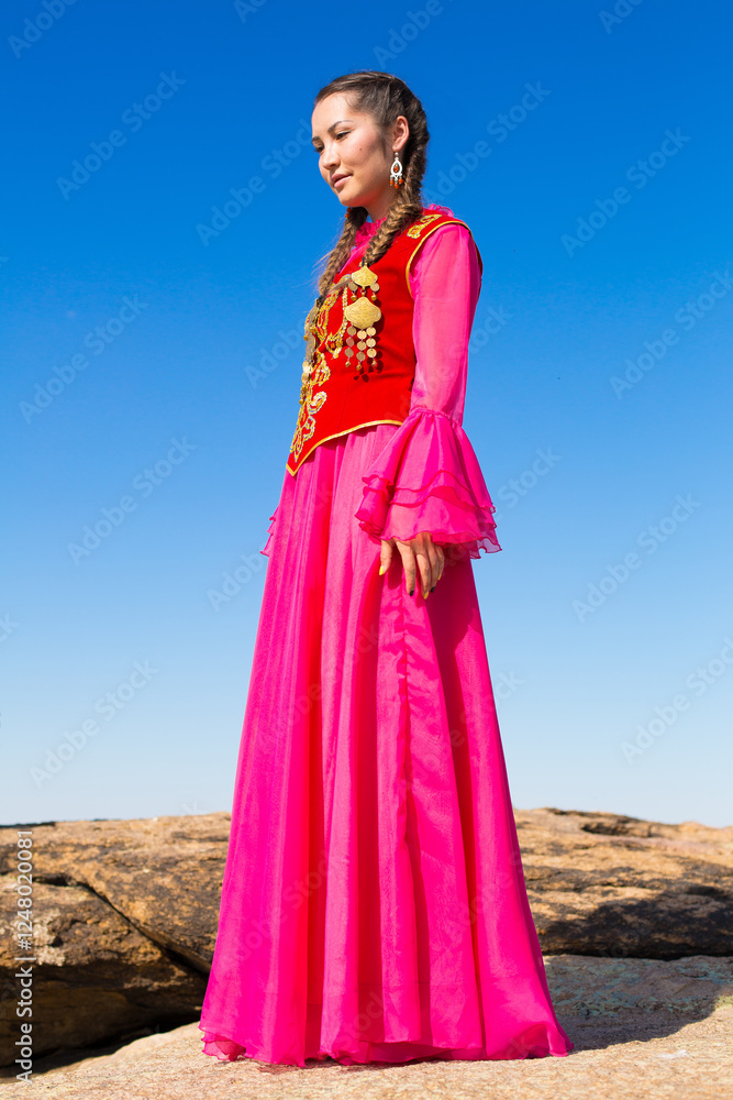 Fototapeta premium Kazakh woman and man in national costumes