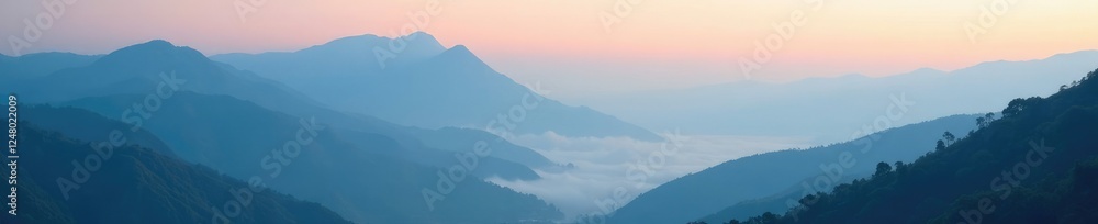 Misty veil rising from the valleys and hills of a mountain range, hills, atmosphere Misty veil rising from the valleys and hills of a mountain range, hills, atmosphere
