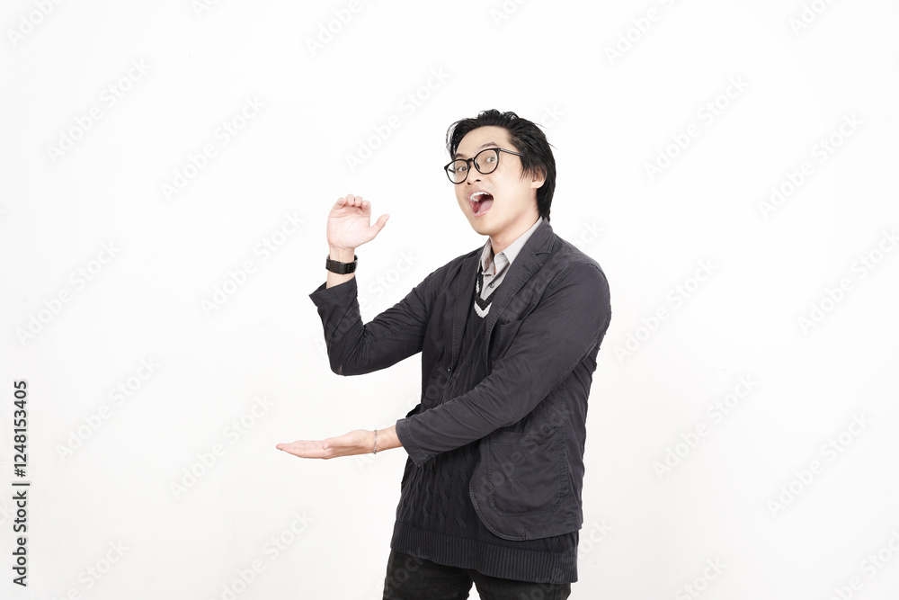 Holding and Presenting copyspace on open palm, Measuring something Of Handsome Asian Man Isolated On White Background
