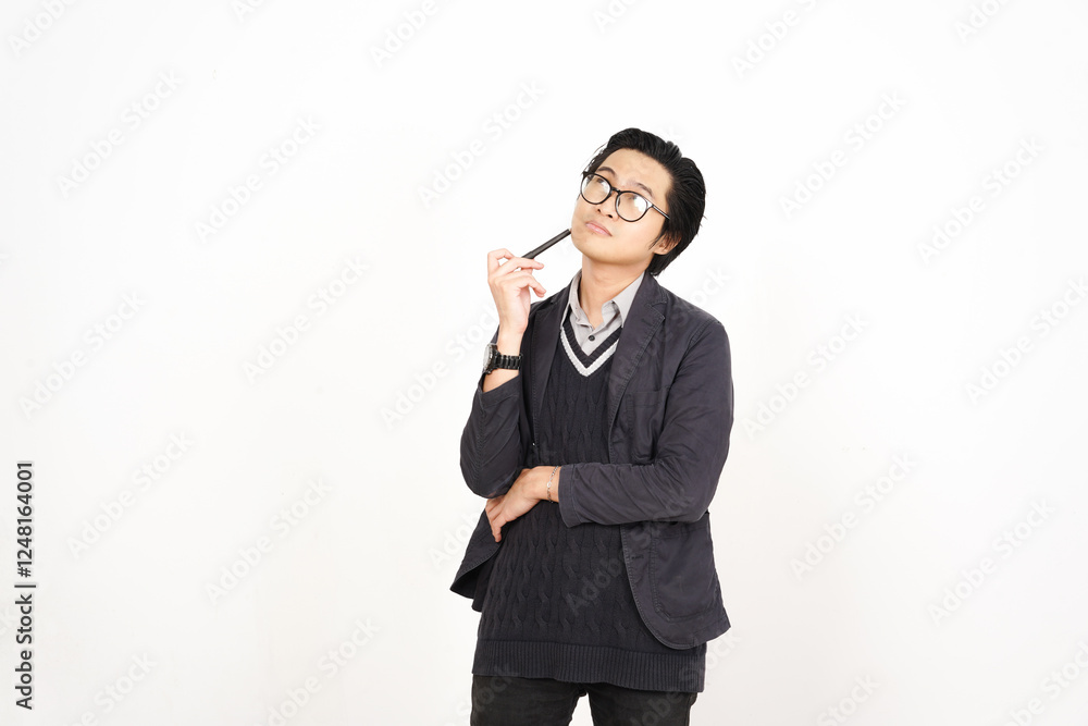 Holding pen smiling while thinking gesture Of Handsome Asian Man Isolated On White Background Holding pen smiling while thinking gesture Of Handsome Asian Man Isolated On White Background