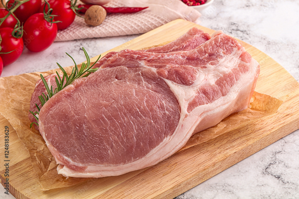 Raw potk loin steak with bone Raw potk loin steak with bone