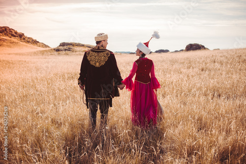 Kazakh woman and man in national costumes