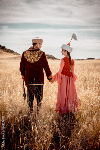 Kazakh woman and man in national costumes