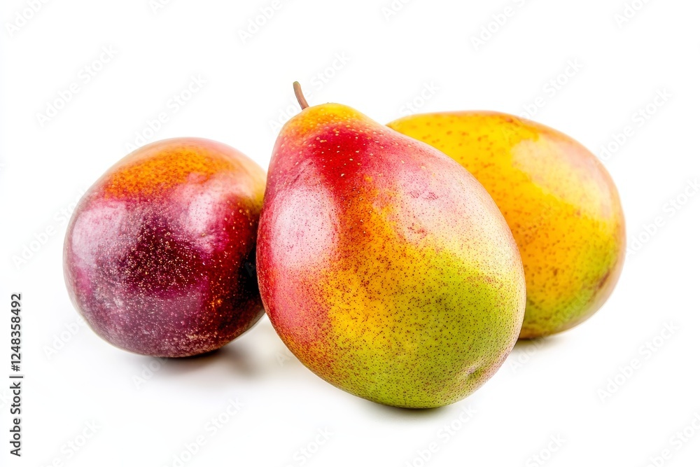 Fresh pears and mangoes, studio still life, white background Fresh pears and mangoes, studio still life, white background