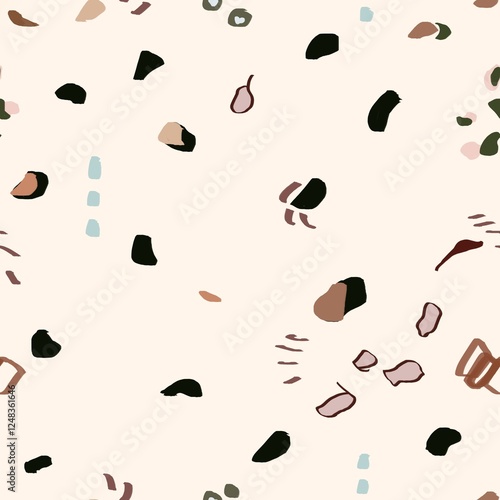 abstract scatter seamless pattern in earthy tones of beige and terracotta ideal for fabric, stationery, or home decor