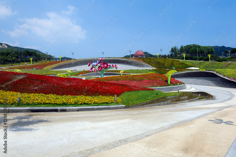 Obraz premium Flower beds in the central square of the World Horticultural Expo Park, Qingdao, Shandong, China. August 2014, China.