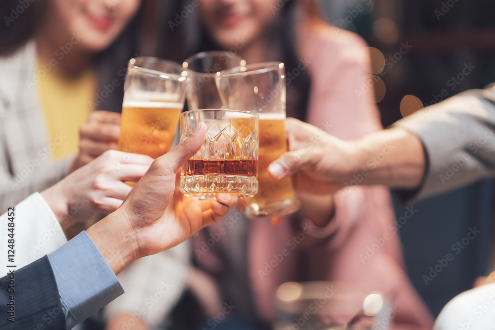 Cheers to Connection: Close-up of hands clinking glasses of beer and whiskey, symbolizing camaraderie and shared moments of celebration. Cheers to Connection: Close-up of hands clinking glasses of beer and whiskey, symbolizing camaraderie and shared moments of celebration.