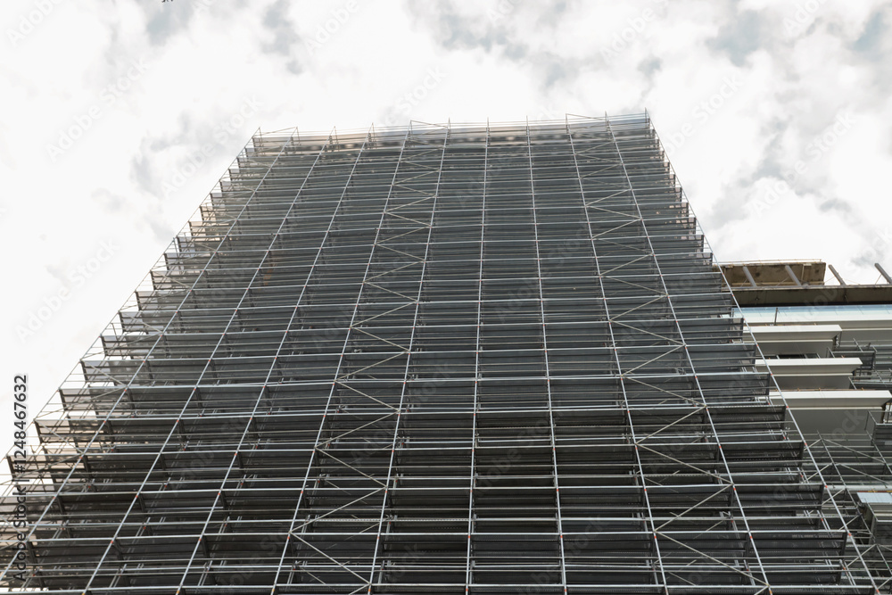 Metal Scaffolding on Building Facade, building materials assembly, structural design infrastructure