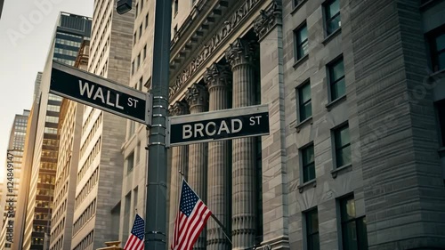 Wall Street and Broad Street sign in New York City, finance, business and travel. Architecture, investment and urban with building, American flag and economy in downtown Manhattan