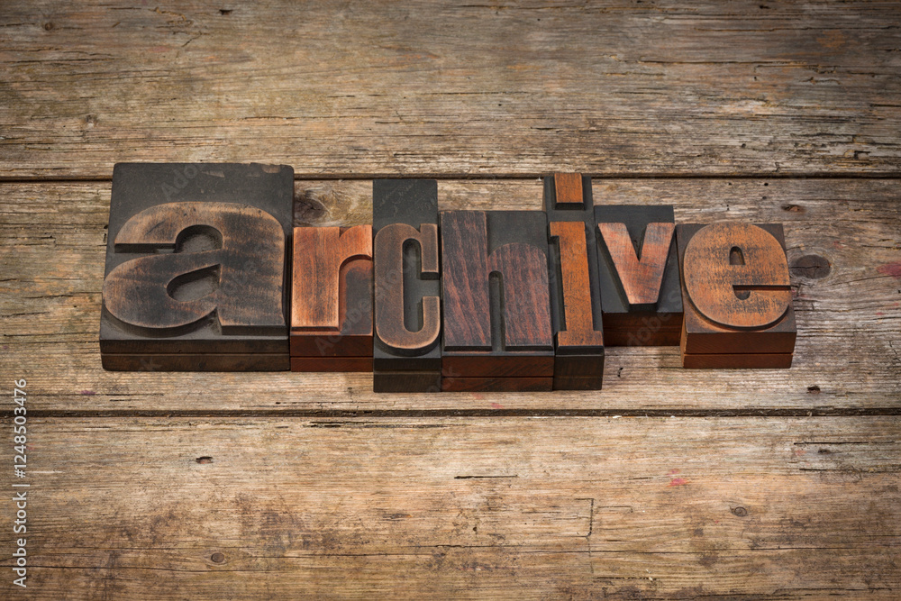 Fototapeta premium archive, word written with vintage letterpress printing blocks on rustic wooden background