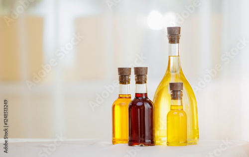 Foto Craft extra virgin set oil of sunflower, olive in glass bottles on background of