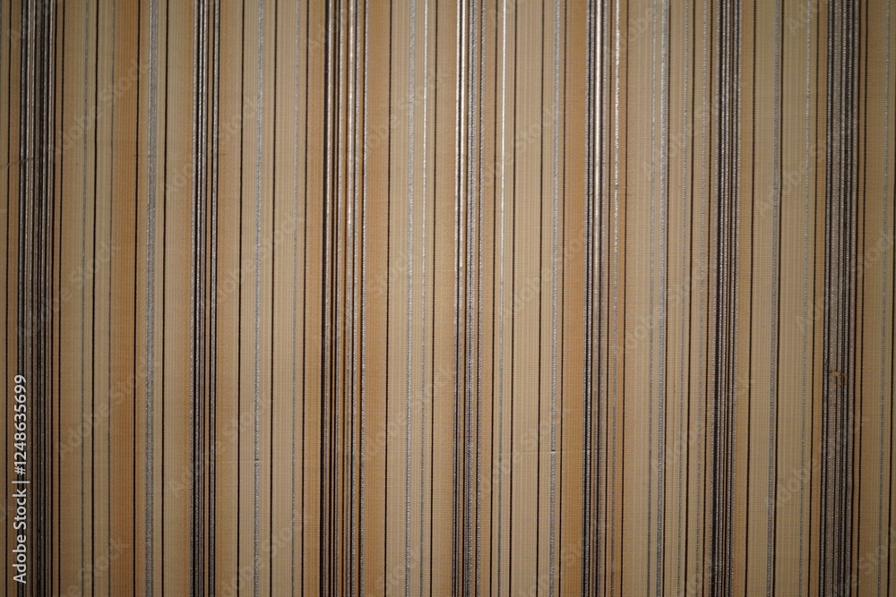 Fototapeta premium Textured fabric with vertical stripes in warm neutral tones for interior design