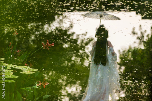 reflection of a woman in hanfu