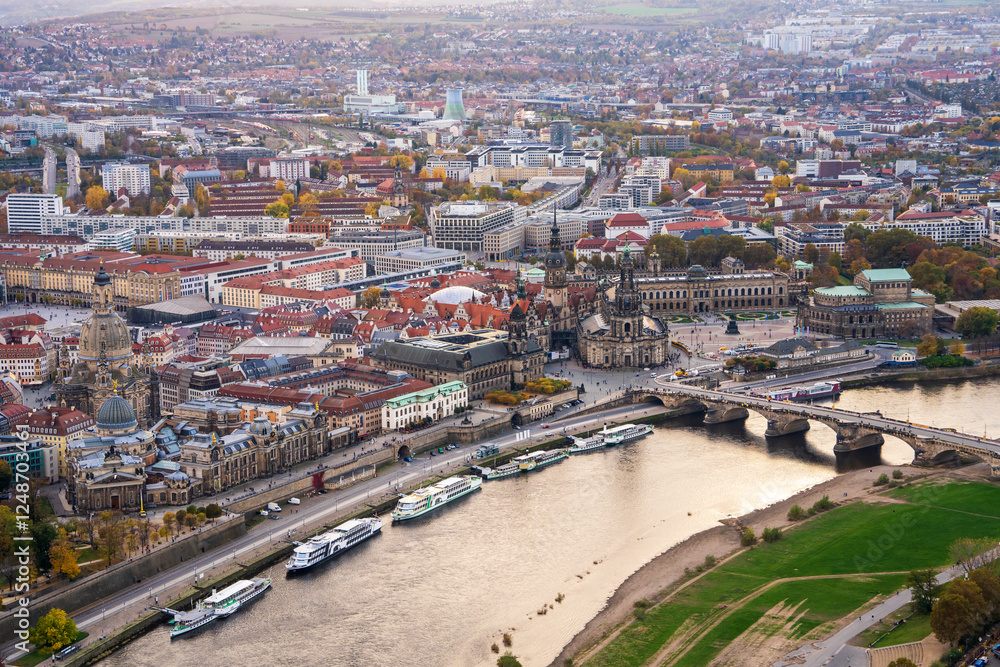 Fototapeta premium Stunning view of Dresden at sunset from hot air balloon. Charming cityscape with historic houses and winding Elbe River