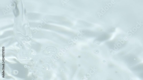 White distilled vinegar is poured macro slow motion